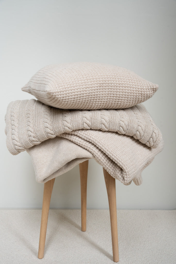 Sierkussen en plaids